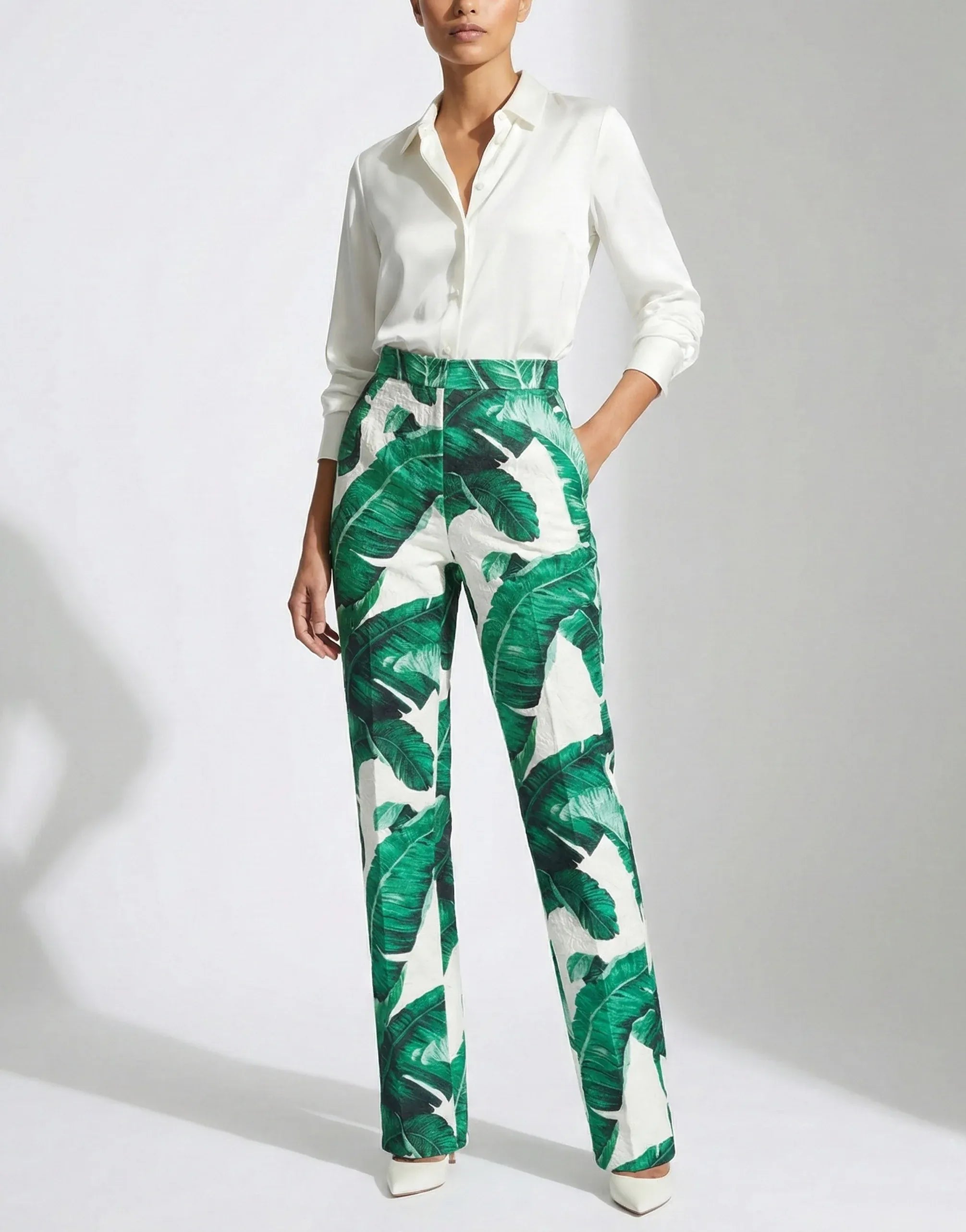 Dolce
Gabbana High-Waisted Banana Leaf Print Trousers